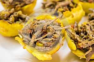 Plantain baskets filled with shredded meat