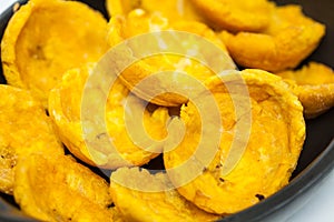 Plantain cups on black ceramic dish