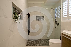 Plantation shutters ensuite bathroom - selective focus