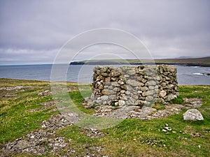 A planticrub on the Hill of Ure overlooking the Dale of Ure in north Shetland, UK