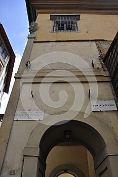 Plaque with inscription from Dante on Wall of Ponte Vecchio Bridge over Arno river of Florence Metropolitan City. Italy