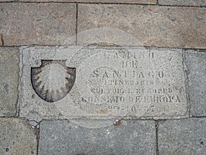 Plaque on Kilometer 0 at Obradoiro square with text in spanish photo