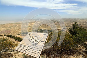 Plaque showing the distance from Mount Nebo to various locations, Jordan, Middle East