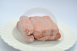 Plare of Uncooked Pork sausages