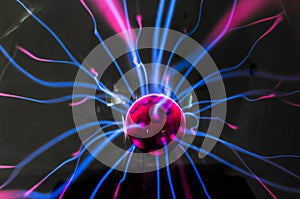 Plasma ball with magenta-blue photo