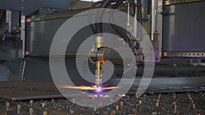 Plasma cutting machine cuts metal material with sparks