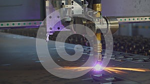 Plasma cutting machine cuts metal material with sparks