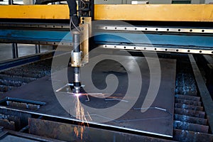 Plasma cutting machine, flame with sparks, metal cut process, metal cutting