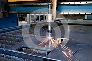 Plasma cutting machine, flame with sparks, metal cut process, metal cutting