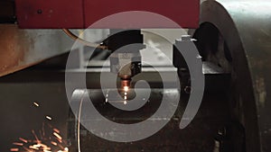 Plasma cutting of metal pipe on a CNC machine. Fire cutting of metal pipe