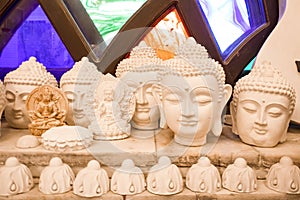 plaster buddha heads. sculpture. photo