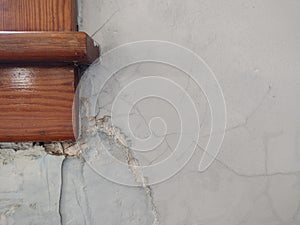 Plaster Cracks Near Wooden Window Moulding