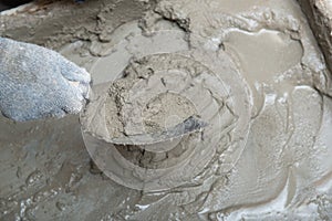 Plaster preparation. Man plastering wall. Worker makes renovation. Construction work