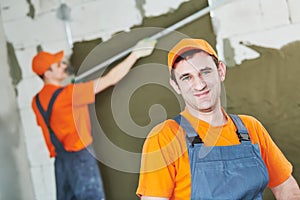 Plaster service. portrait of male plasterer