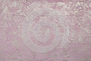 Plaster texture wall. Abstract background. Stucco wall texture. Effect plaster. Pink with silver paint pattern. Texture stone. Rou