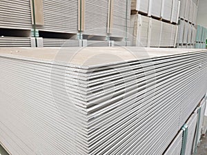 plasterboard sheets stacked in a hardware store. building material.