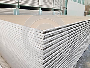 plasterboard sheets stacked in a hardware store. building material.