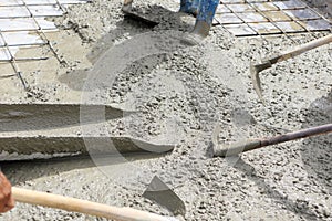 A plasterer concrete worker at floor work