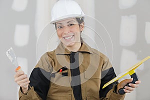 Plasterer at indoor wall work