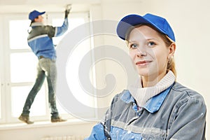 Plasterer Portrait at indoor wall work