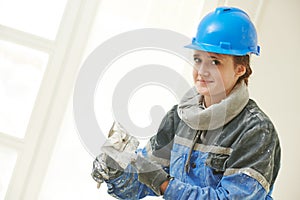 Plasterer Portrait at indoor wall work