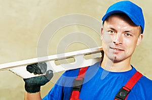 Plasterer with work tool
