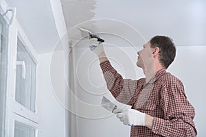 Plastering a ceiling photo