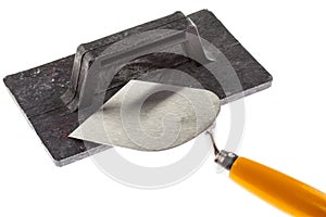 Plastering trowel and construction surfacer photo