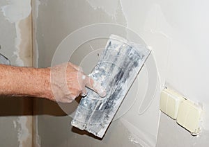 Plastering Wall With Plaste, Finishing And Plaster Spatula Trowel