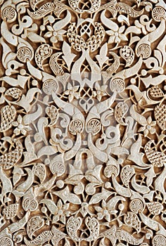 Plasterwork in arabic style. Palace of Alhambra in Granada, Andalusia, Spain.