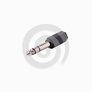 Plastic audio Jack adapter minijack to Jack, isolated on white background. Close up