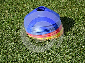 Plastic baffles on the grass of the soccer field