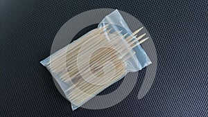 A plastic bag of bamboo toothpicks