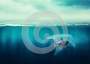 Plastic bag with a fish in the ocean