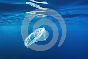 plastic bag floating on the surface of the ocean