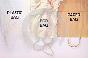 Plastic bag vs paper pack vs fabric eco bag. Say no to plastic. Reduce, reuse and recycle concept. Eco friendly bag