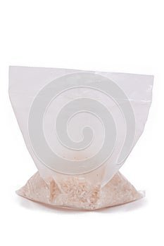 A Plastic Bag of White Long Grain Rice - Isolated on White