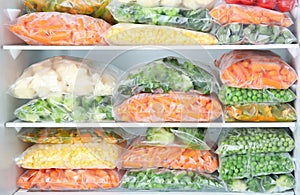 Plastic bags with deep frozen vegetables