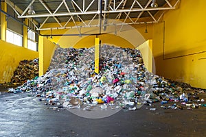 Plastic bales at the waste processing plant. Separate garbage collection. Recycling and storage of waste for further disposal.