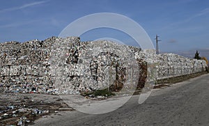 Plastic bales at the waste processing plant. Separate garbage collection. Recycling and storage of waste for further disposal. Env