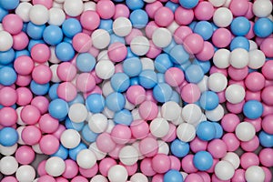 plastic balls for seaballs. pink, blue, white colored toys. pool children's playroom.