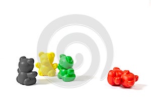 Plastic bear figures in the colors of the coalition parties who form the 2017 state government of Schleswig-Holstein Germany wit