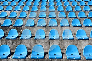 Plastic blue seats on football stadium