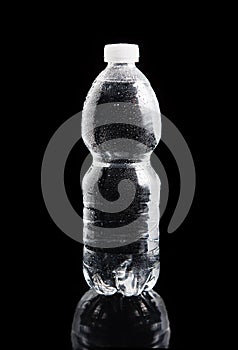 Plastic bottle on a black background