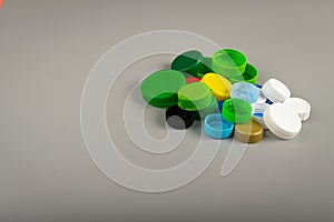 Plastic Bottle Caps Pile. Recycling HDPE Material Group, Circle Polyethylene Lid Set, Colorful Caps Group