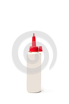 A plastic bottle of carpenter`s glue on a white background