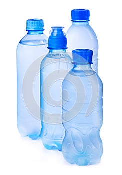 Plastic bottle of drinking water isolated on white background. Set of water transparent plastic bottles liquid