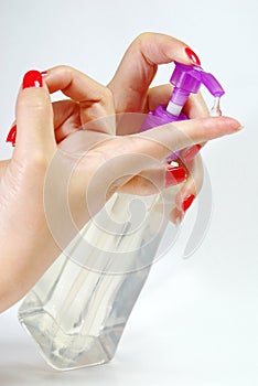 Plastic bottle and hand