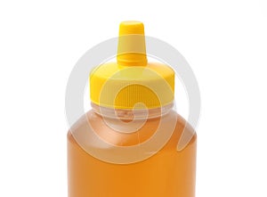 Nature pure honey in plastic bottle