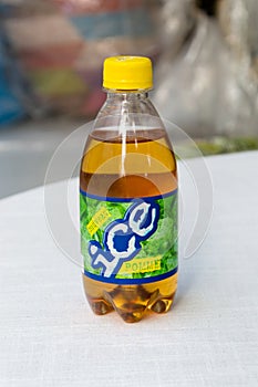 Plastic bottle ice pomme soft drink.